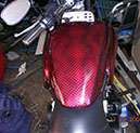 047B